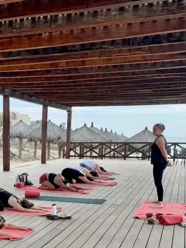 Penny Bailey leading outdoor group fitness and yoga training session