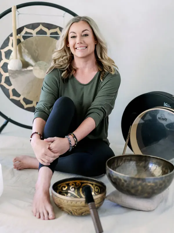 Penny Bailey with gong and singing bowls for sound journey meditation events at Life Time Fitness Scottsdale